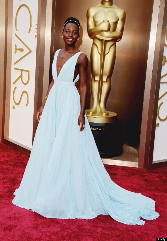 Lupita Nyong'o attends the Oscars in 2014 wearing Prada and Fred Leighton jewelry. Photo by Steve Granitz/WireImage Lupita Nyong'o attends in 2014 wearing Prada and Fred Leighton jewelry. Photo by Steve Granitz/WireImage