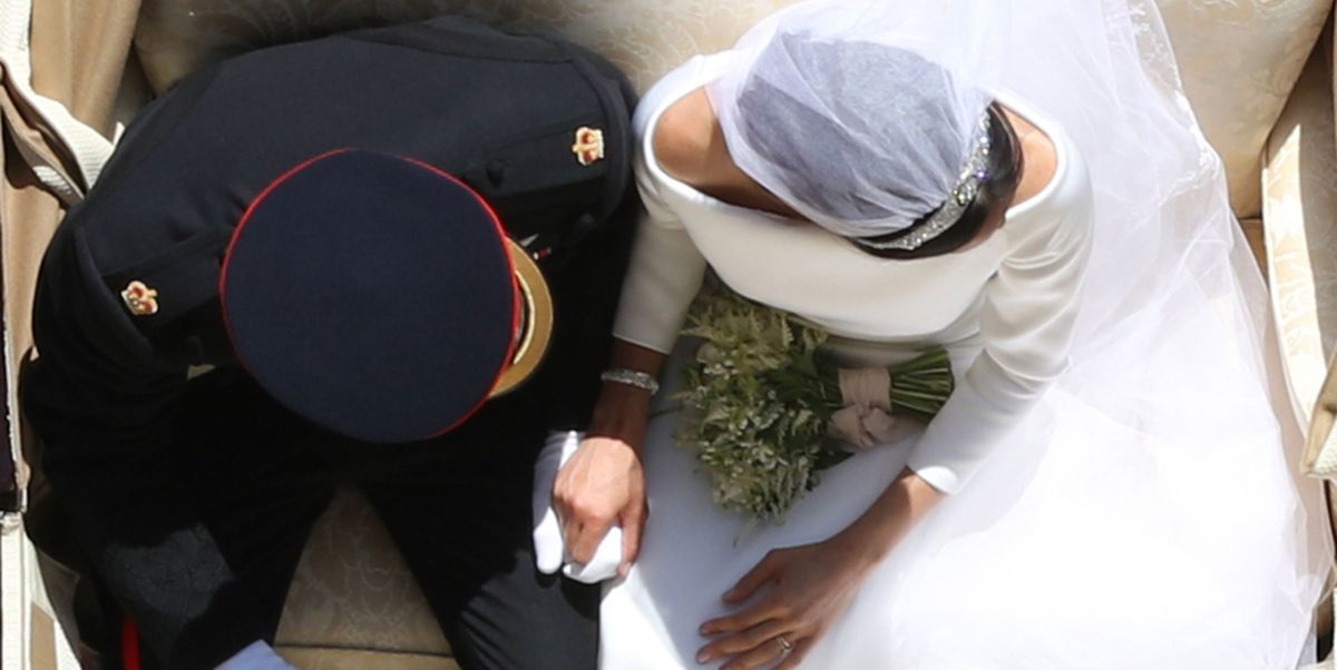 The Duke and Duchess of Sussex aka Prince Harry and Meghan Markle on their carriage procession through Windsor, England. Photo: Yui Mok/PA/Getty Images - Royal Wedding The Duke and Duchess of Sussex aka Prince Harry and Meghan Markle on their carriage procession through Windsor, England. Photo: Yui Mok/PA/Getty Images