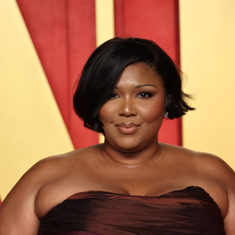 Lizzo rocking a styled flapper bob on the red carpet