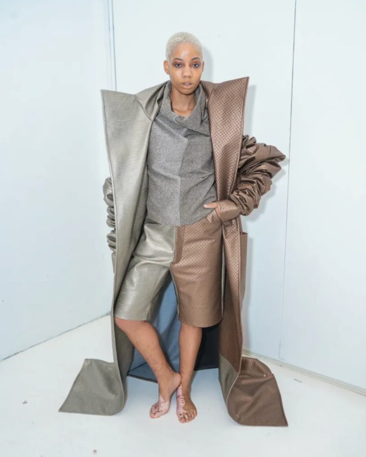 Model in a 3-piece copper look designed by Joseph McRae.